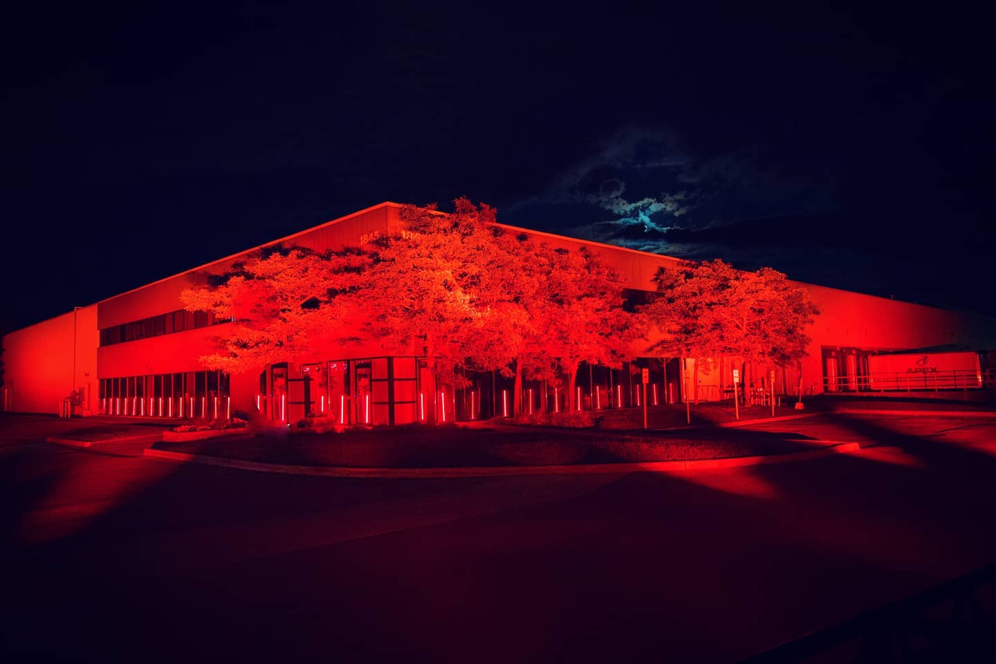 Apex Sound and Light head office in Pickering Ontario, covered in red light.